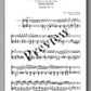 Sheet music with musical notation and text on a white background