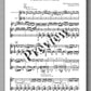 Sheet music for a musical piece with text and musical notation on a white background