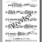 Sheet music with musical notation and text on a white background