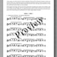 Sheet music with text and notation on a white background